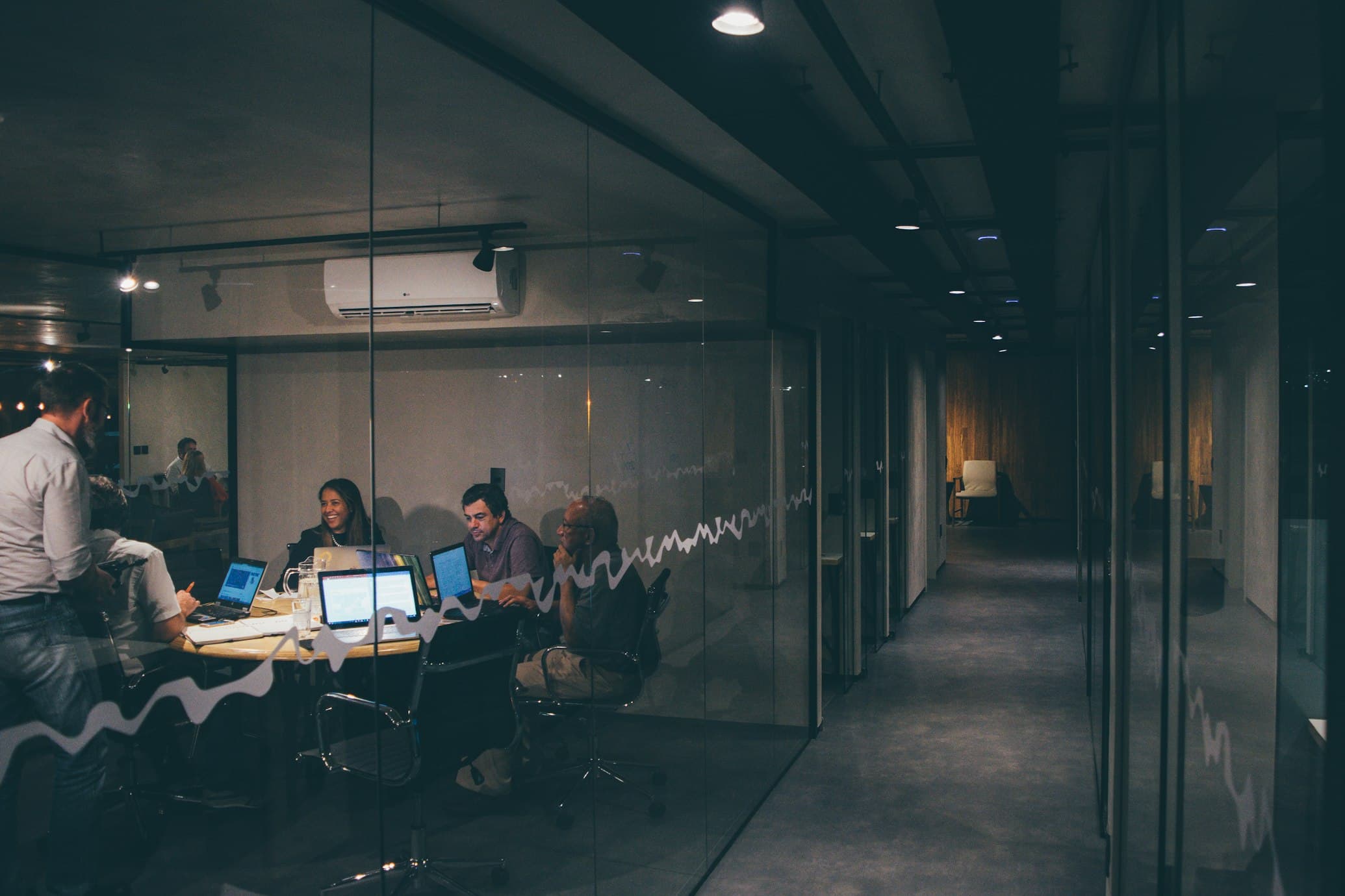 Modern office space with tech team working